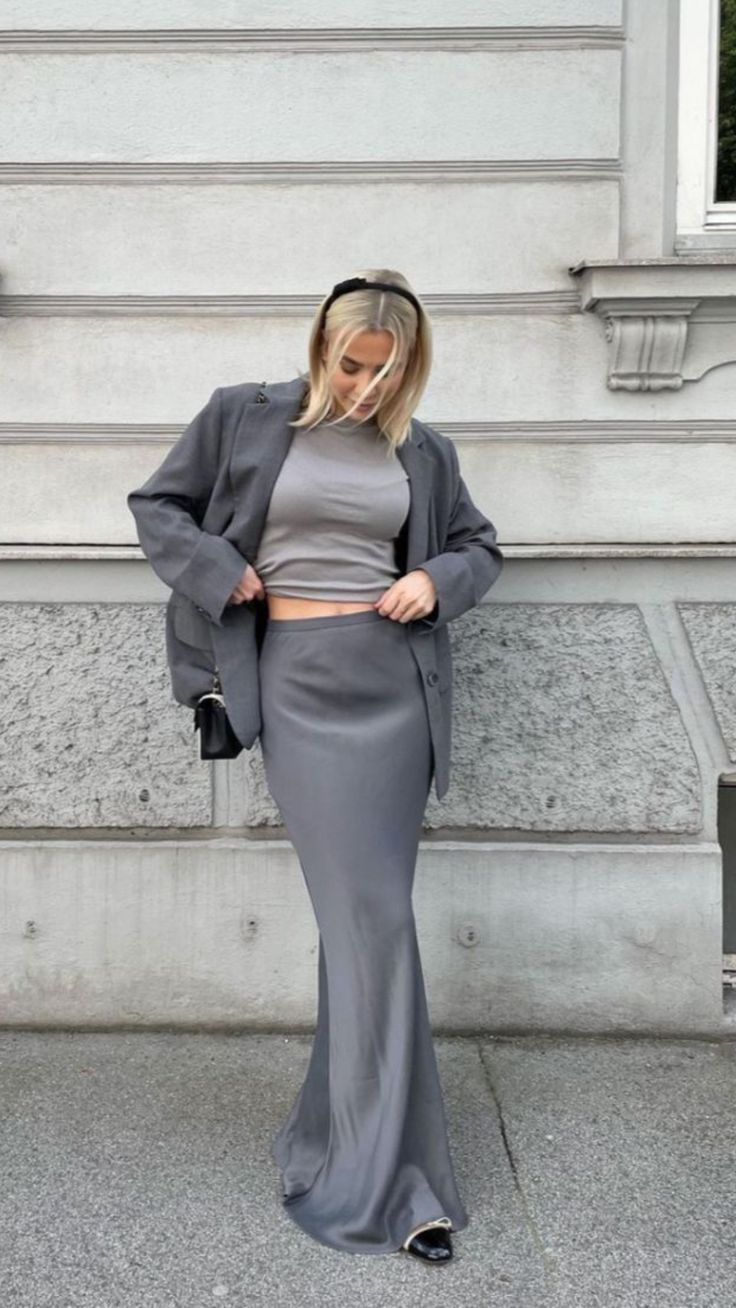 Gray crop top and matching silk maxi skirt with a gray blazer